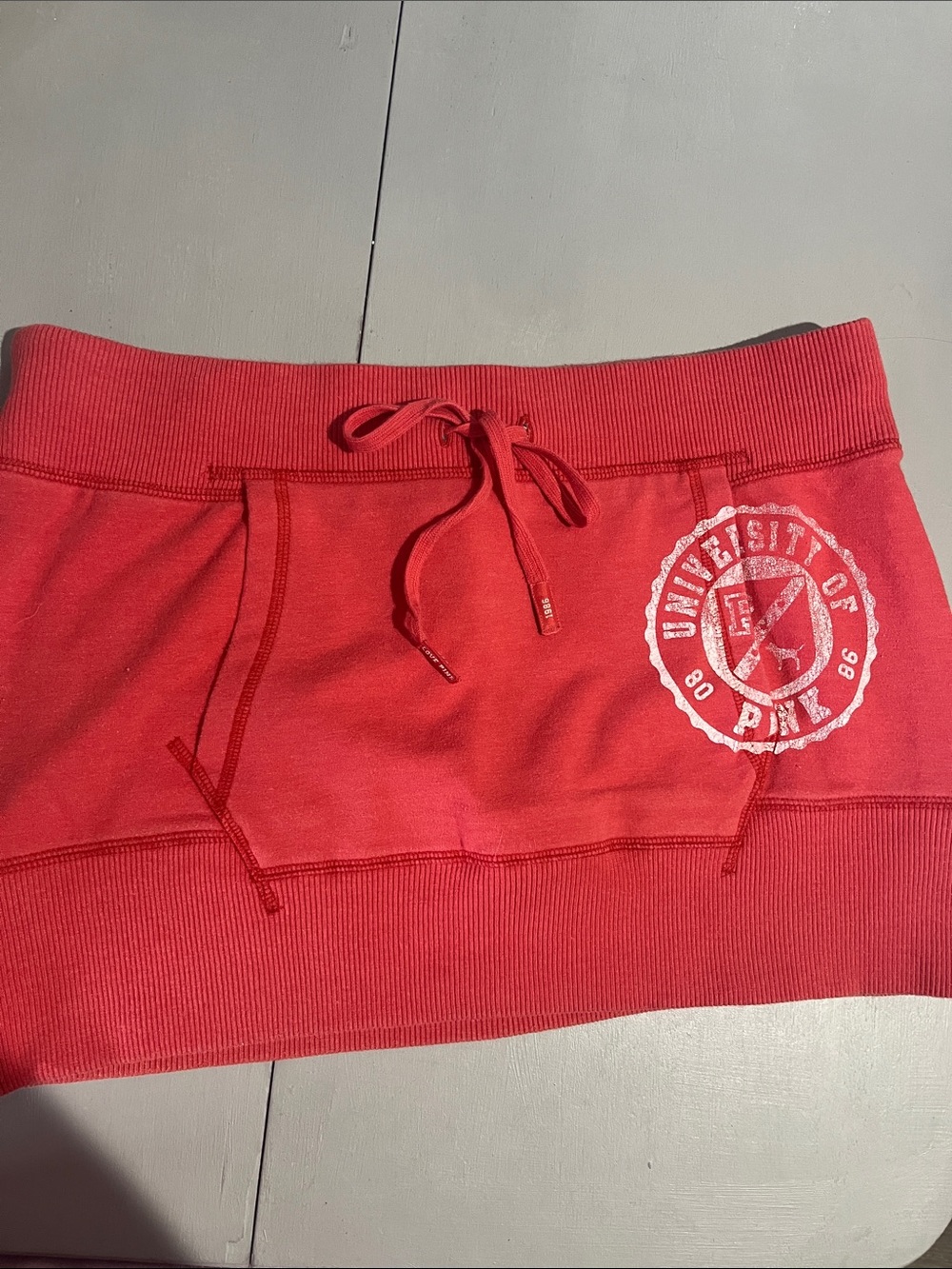 PINK Victoria's Secret Coral Drawstring Mini Skirt with Logo Patch